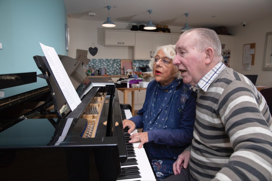 Renowned pianist leads sing song at local care home